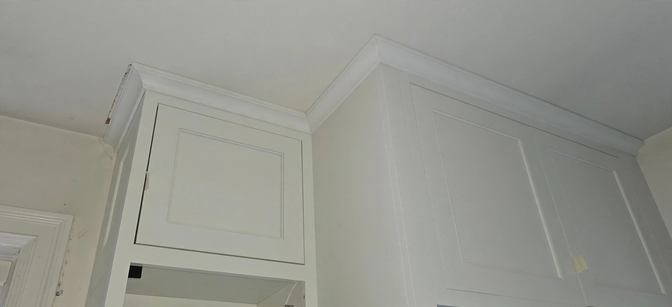 Installed cabinets with crown molding to the ceiling in Missoula