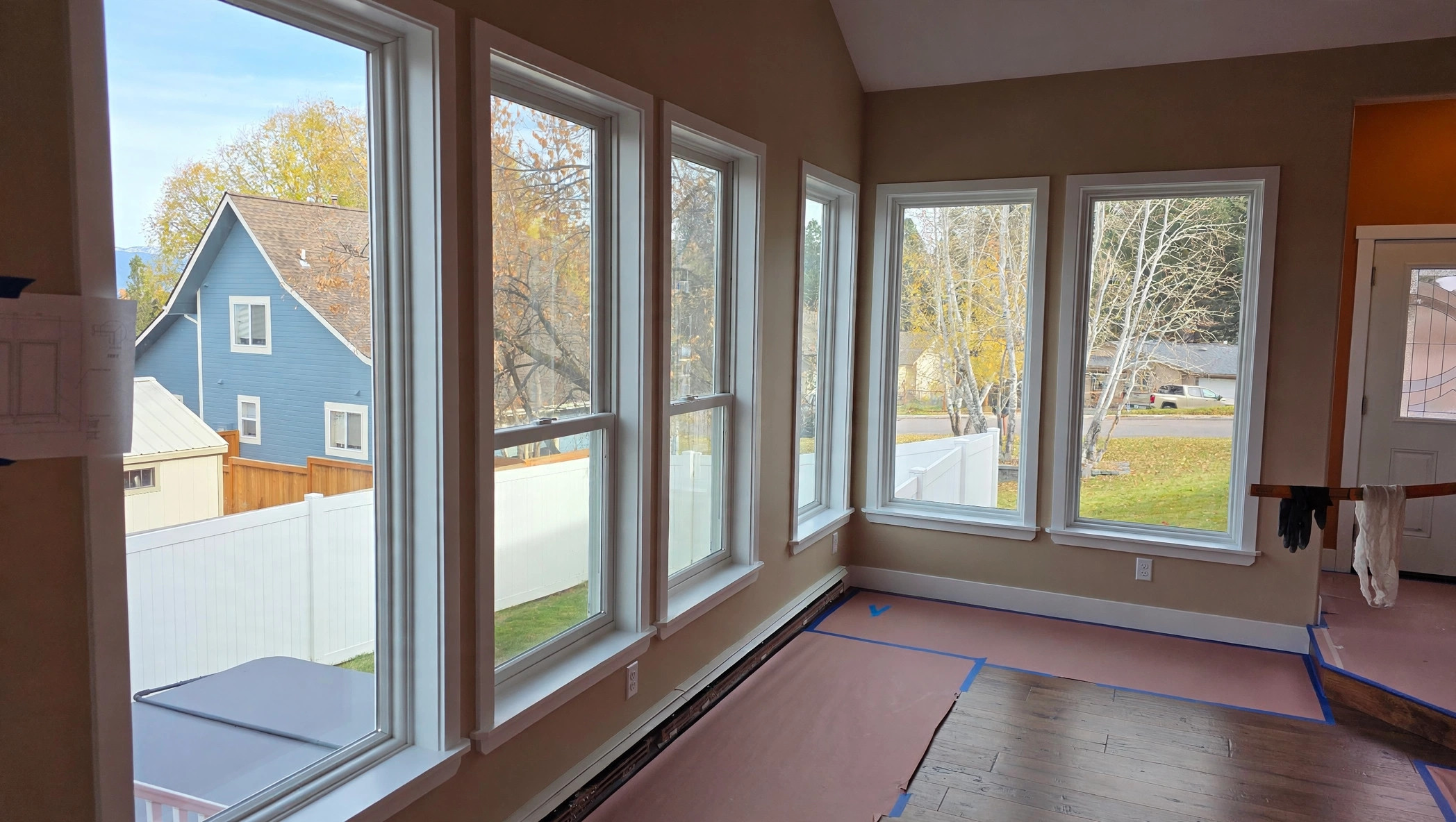 Wall of windows with fresh white casing and sills